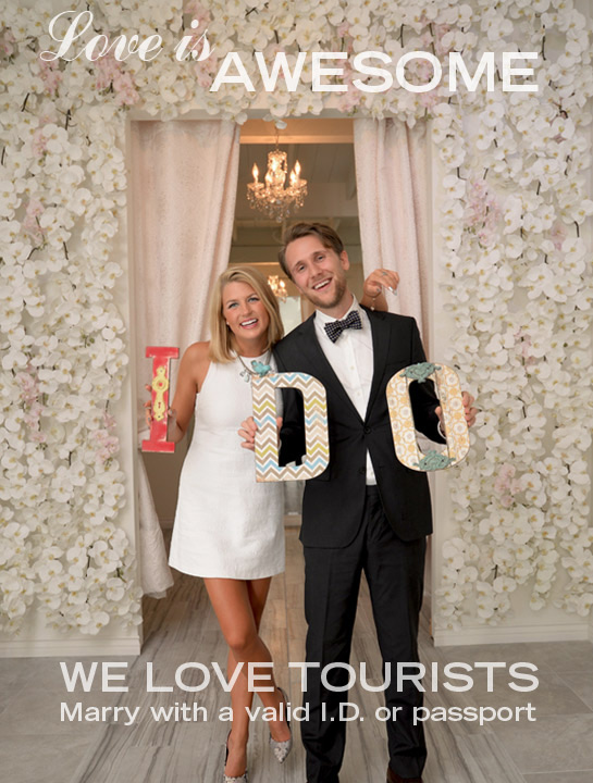 Albertson Wedding Chapel couple holding "I Do" sign