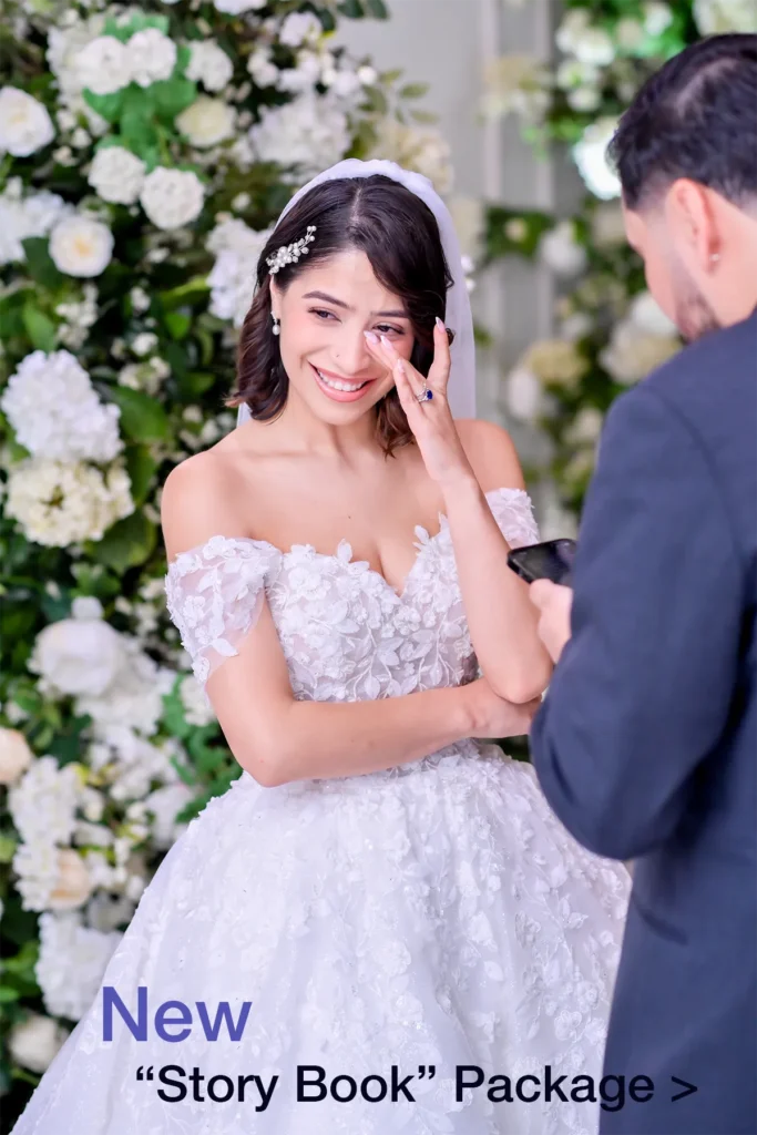 Spanish speaking bride emotional while hearing her groom say his vows during her story book wedding package