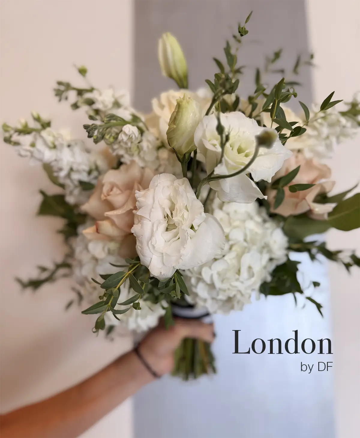 "London" bouquet designed by Daniel Franco for Albertson Wedding Chapel made of roses, lisianthus, stock, eucalyptus, hydrangea